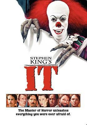 Cover art for the 1990 TV miniseries It, featuring the face of the evil clown, Pennywise, and the adult cast below the title.